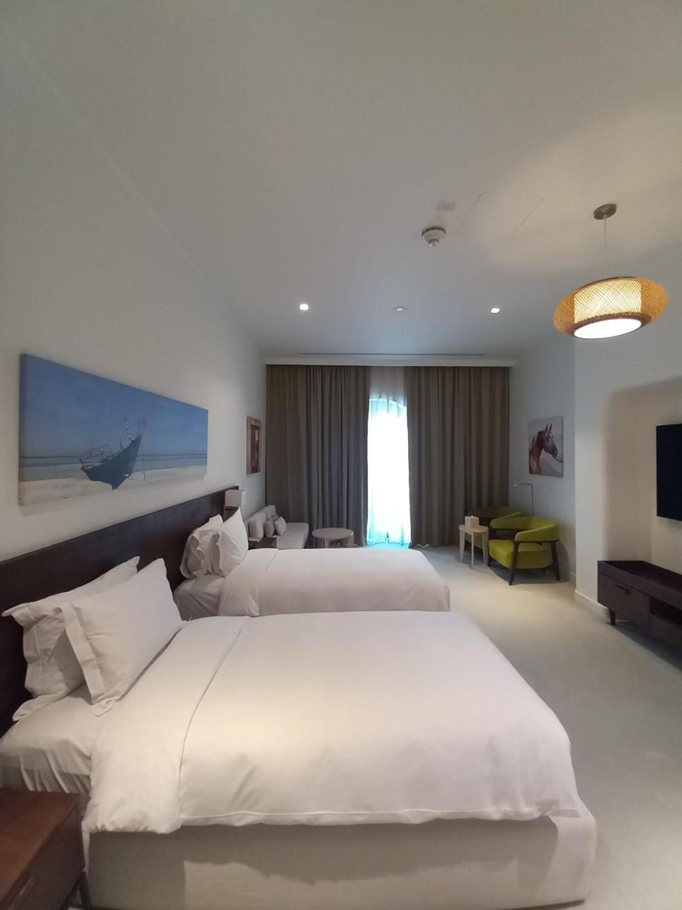 Mina Hotel And Residences By The Torch الدوحة المظهر الخارجي الصورة A room at the hotel