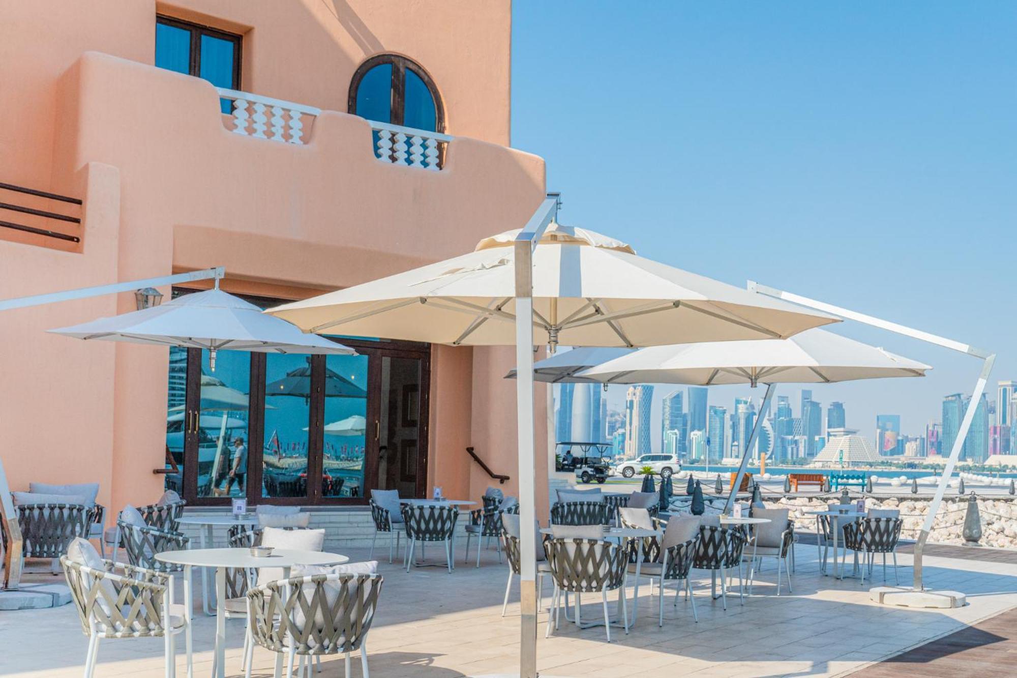 Mina Hotel And Residences By The Torch الدوحة المظهر الخارجي الصورة A patio umbrella