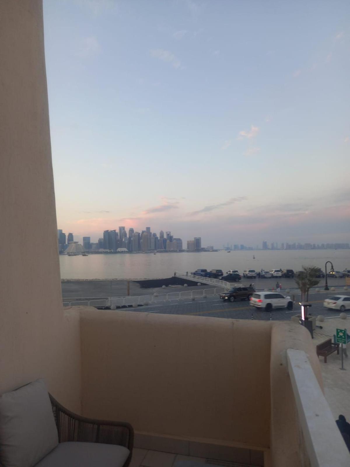 Mina Hotel And Residences By The Torch الدوحة المظهر الخارجي الصورة View of Manama skyline from a residential area in Saar